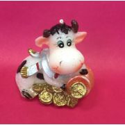 Свеча Корова серый шарф с боченком рассыпанных монет